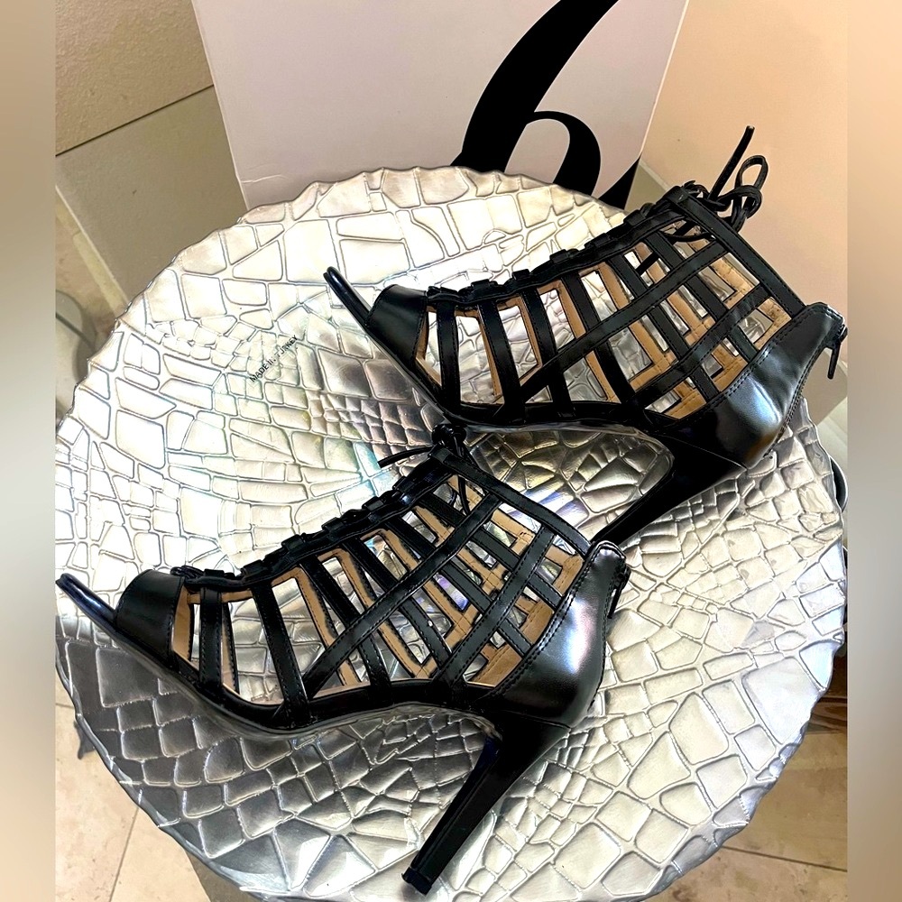 Nine West caged high heel lace up booties